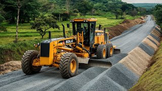 The main technology yellow motor grader machine with the brand SDLG Making pushes layers of gravel [upl. by Prisca]