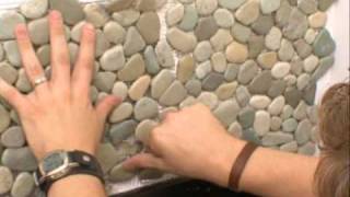 Natural Pebble Tile on DIY Networks quotBathTasticquot [upl. by Laresa]