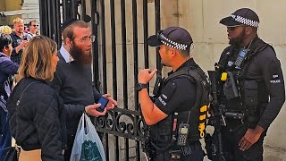 RUDE IDIOT CALLED OUT AND SPOKEN TO BY POLICE AFTER MOCKING the Guard at Horse Guards [upl. by Einahpts]