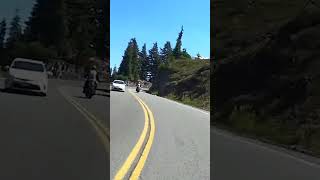 Riding through mountains on a Janus Halcyon 450 motorcycle [upl. by Nnyleimaj]