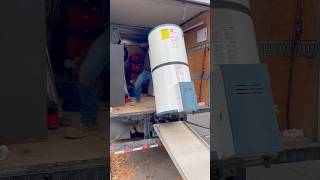 💧🔥 MustKnow Tip for Leaking Rheem Water Heater Removal  Protect Your Floors [upl. by Sillihp296]