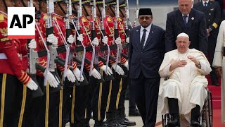 Pope Francis arrives in Indonesia to start the longest trip of his pontificate [upl. by Latrina]