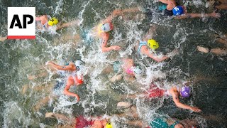 Triathlon kicks off on Day 5 at Paris Olympics  AP Top Photos [upl. by Leverett]