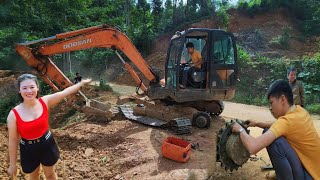 The guy repaired and welded the excavator door replaced the sprocket and leveled the road [upl. by Cindi120]