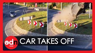 Shocking Moment Car ‘Flies Over Roundabout in Poland [upl. by Ax]