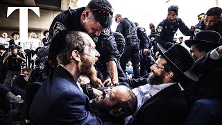 Ultraorthodox Jews clash with Israeli police after military ruling [upl. by Alake232]