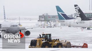 BC snowstorm causes flight cancellations and delays at YVR airport [upl. by Brandice525]