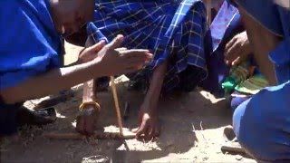 Massai machen Feuer  Massai lighting a fire in traditional way [upl. by Drona]