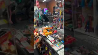 711 employee attempts to fight off looters from car takeover in LA [upl. by Aushoj760]