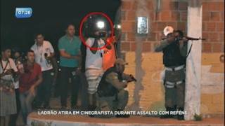 Ladrão atira em cinegrafista durante assalto a casa lotérica [upl. by Ozner]