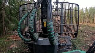 John Deere 1010G Loading spruce pulpwood [upl. by Jacy]