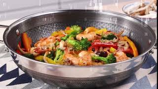 HexClad 12 Inch Hybrid Stainless Steel Wok with Stay Cool Handle Dishwasher and Oven Safe [upl. by Galatea]