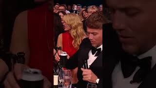 Kylie Minogue drinks out of a shoe with BRITs host Roman Kemp 🫢 kylieminogue brits ytshorts [upl. by Annahtur]