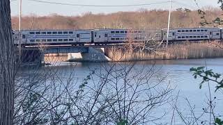 LIRR Trains Passing close by the Forge River Marina on the Bridge [upl. by Arela]