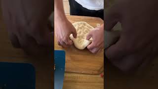 Pizza dough stretching pizza pizzashorts howto tutorial [upl. by Htidirem]