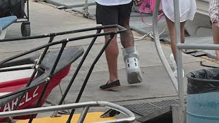 Cowboys QB Dak Prescott seen in a boot during summer offseason [upl. by Lorusso467]