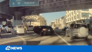 CAUGHT ON CAMERA Driver robbed while in San Francisco traffic near I80 onramp [upl. by Eymaj]