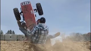 Wheel horse mud mower flips on a big hill [upl. by Redliw]