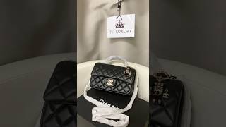 Chanel Mini Flap Bag with Top Handle and a Cute Charmchanel chanelflap flapbag bagcollection [upl. by Christina]