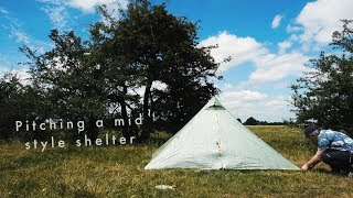 Pitching a midstyle shelter [upl. by Nillek]