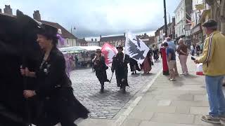 The parade of Morris Dancers arrives at the Market Cross in Saturday Market Beverley [upl. by Naivatco901]