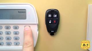 A1 Security Alarms Inc DSC How to use 4 Button Keyfob [upl. by Ilyah]