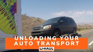 Unloading Your UHaul Auto Transport  Towing A Car  Car Hauler [upl. by Lona]