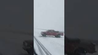 Snow and ice filled freeway reeking havoc on drivers in the Rockies [upl. by Omocaig585]