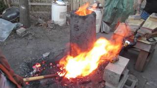 Traditional smelt using manpowered bellows [upl. by Mcconaghy204]