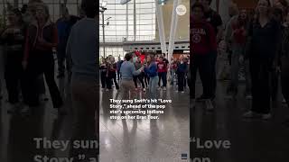 Taylor Swift flash mob breaks out at airport ahead of Eras show  USA TODAY Entertainment [upl. by Schonfield]