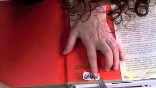 Remove a Library Barcode Sticker with a Book Repair Knife [upl. by Enel]