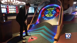 Puttshack brings hightech indoor mini golf to Miami [upl. by Michaud331]