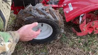 How To Unlock TroyBilt Rototiller Wheels To Free Roll Machine To Work Area And Then Relock For Use [upl. by Lucic]