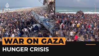 Hungry Palestinians crowd aid truck in Gaza  Al Jazeera Newsfeed [upl. by Saenihp]