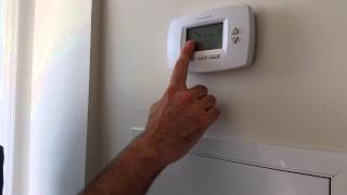 How To Adjust Your Thermostat [upl. by Harbird]