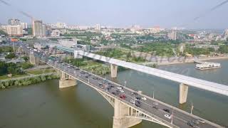 Metro Bridge and Communal Bridge Panorama of the city of Novosibirsk View on the river Ob Russia [upl. by Arak]