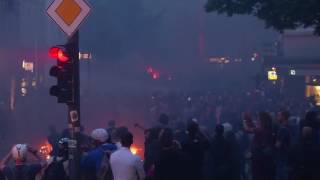 G20 protesters shoot off fireworks as fires burn in the streets of Hamburg Germany [upl. by Moffit]