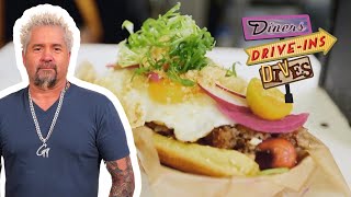 Guy Fieri Comes Back for quotNextLevelquot Filipino Hot Dog  Diners DriveIns and Dives  Food Network [upl. by Wymore]