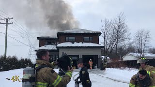 Mascouche Modern house heavily damaged in daytime fire 2202021 [upl. by Suaeddaht994]