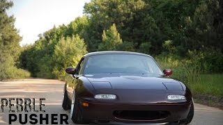 Pebble Pusher  SlammedEnuff Slammed Miata Car Feature  CamberGang [upl. by Anana729]