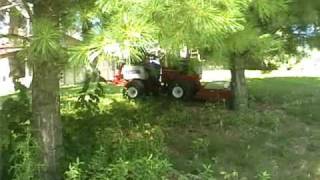 VENTRAC Tractor Mowing Steep Pond Bank [upl. by Alleb920]