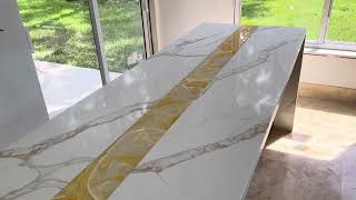 Calacatta Quartz and Onyx kitchen countertops 😍 custom made island with onyx and quartz 😍 [upl. by Nixon499]