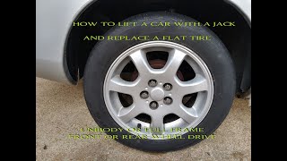 How to lift a car and change a tire [upl. by Caron]