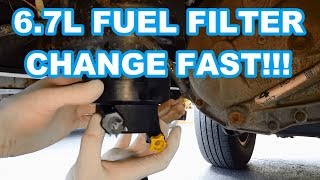 FORD 67L FUEL FILTER CHANGE FAST 20112016 F350 Powerstroke how to change fuel filters reset [upl. by Guibert]