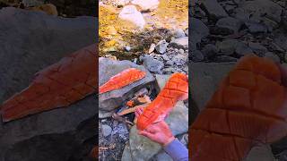 Cooking A Whole Salmon 🐟  SALMON cooked and smoked over fire 🔥 shorts asmr cooking fish [upl. by Laverna772]