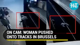 Watch Man intentionally pushes woman in front of moving train at Brussels metro station [upl. by Franci]