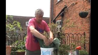 How to make an effortless self watering 14quot hanging basket cheaply [upl. by Salaidh]