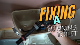 How to Fix a Running Toilet  Replacing The Fill Valve [upl. by Hobard427]