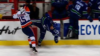 Boeser injured after massive hit from Clutterbuck [upl. by Danzig]