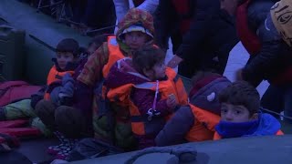 Migrants leave for England from a French beach [upl. by Ewen130]